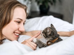 woman with young kitten